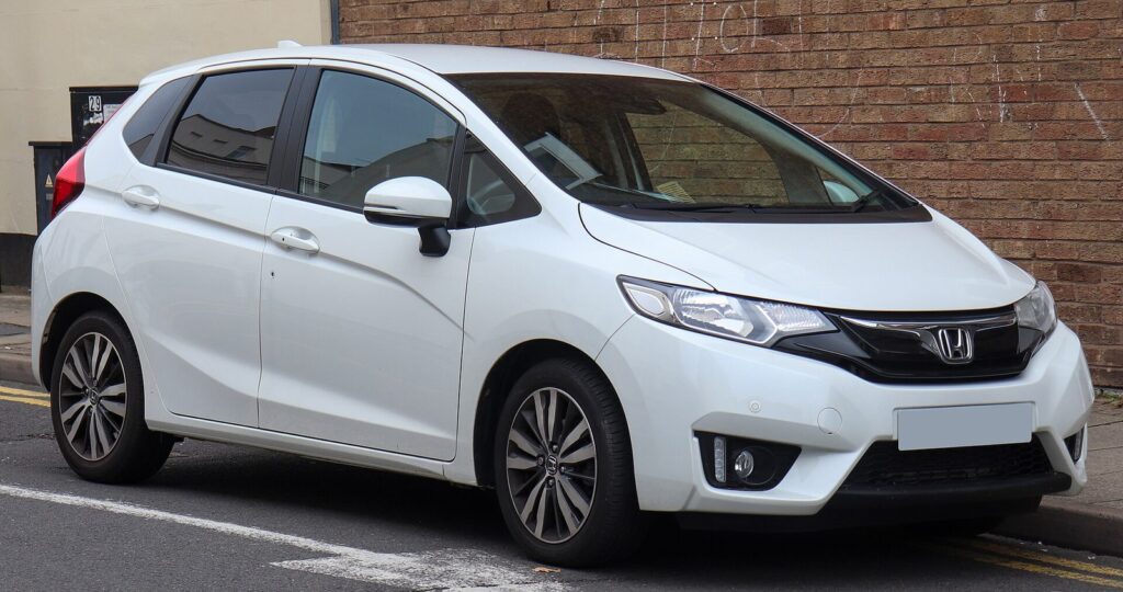 White Honda Fit hatchback from Japan