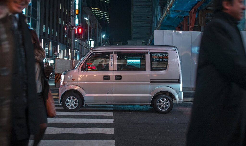 Kei van crossing a street in Japan