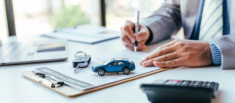 Export documentation for a Japanese used car being signed