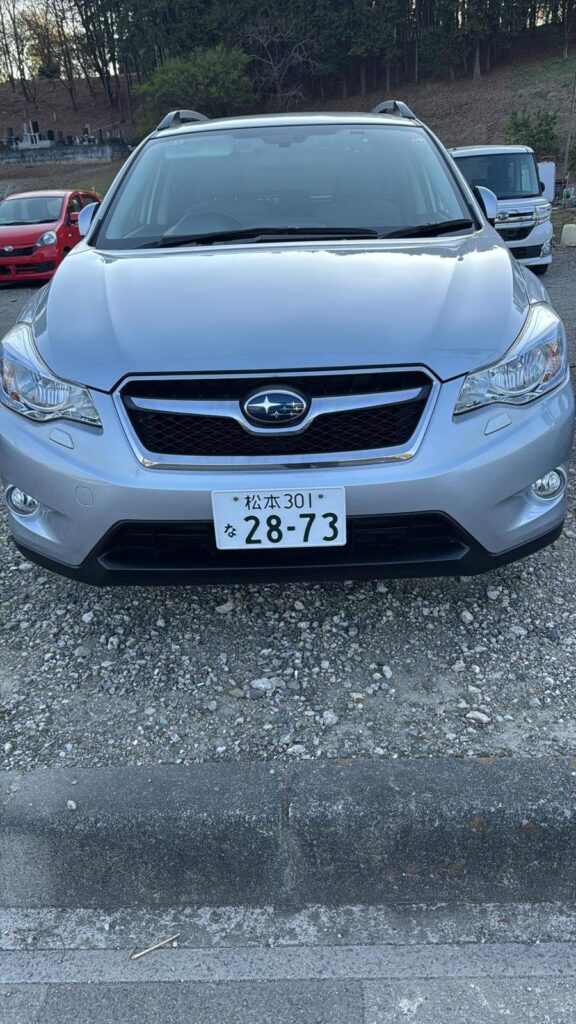 Silver Subaru XV Hybrid front view, Japanese used car