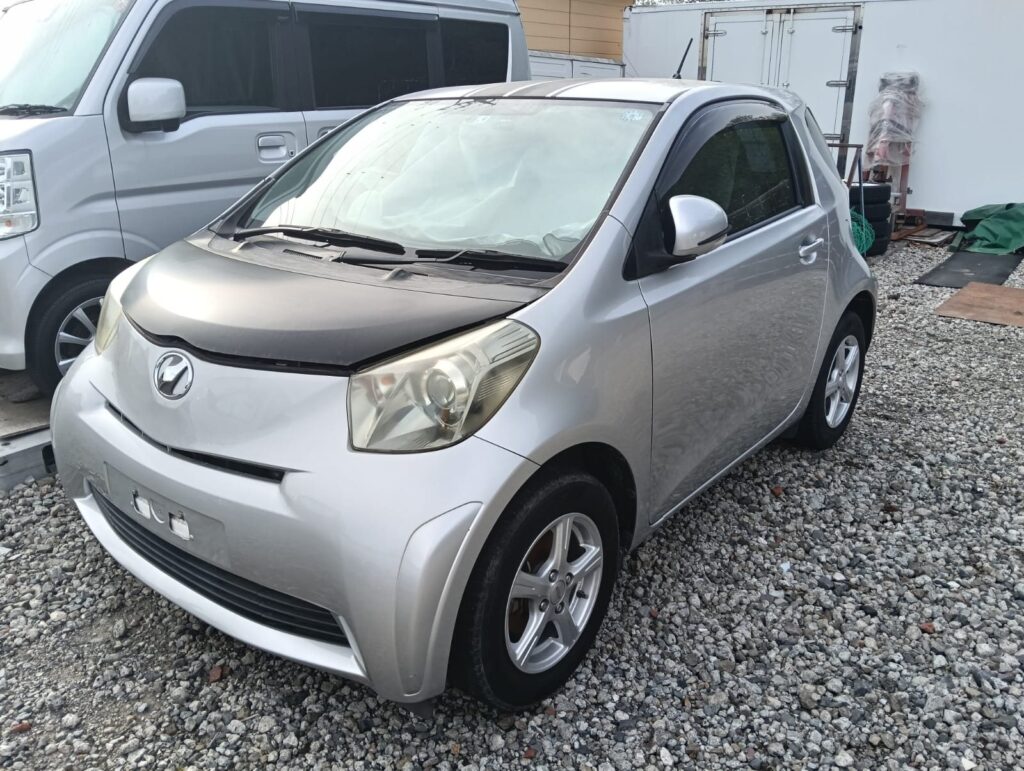 Silver Toyota iQ micro car in stock in Japan
