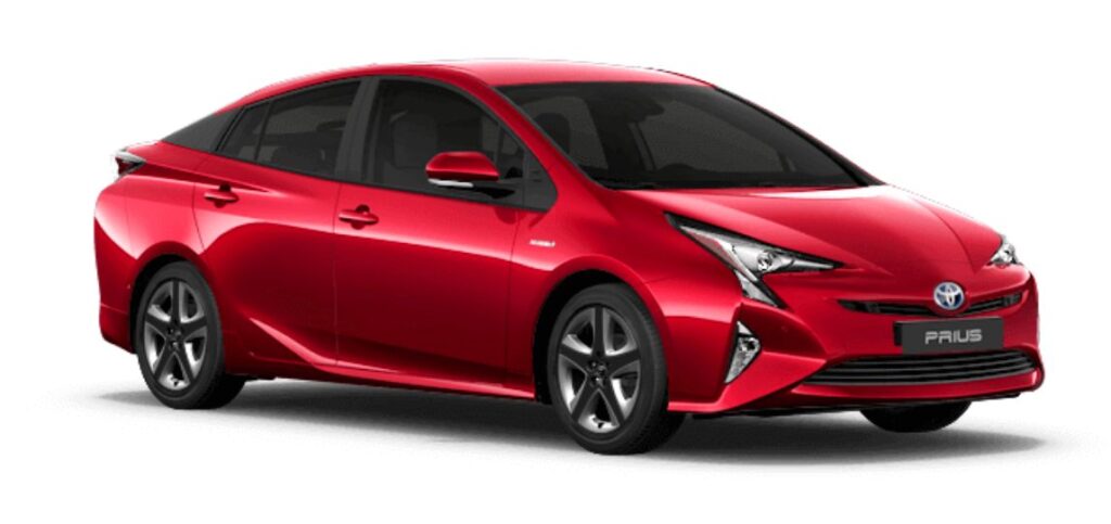 Red Toyota Prius hybrid, a popular used car from Japan